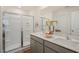 Modern bathroom with double vanity, large shower, and updated fixtures at 233 Holton St, Smithfield, NC 27577