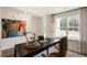 Home office with large window and desk at 233 Holton St, Smithfield, NC 27577