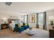 Spacious main bedroom with plush carpet and sitting area at 233 Holton St, Smithfield, NC 27577