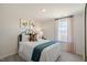 Charming bedroom with a queen bed and window at 233 Holton St, Smithfield, NC 27577