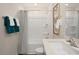 Bathroom with tub, shower, and single vanity at 233 Holton St, Smithfield, NC 27577