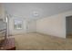 Living room featuring carpet, fireplace, and lots of natural light at 9847 Snow Camp Rd, Snow Camp, NC 27349