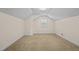 Simple bedroom with window and carpet flooring at 9847 Snow Camp Rd, Snow Camp, NC 27349