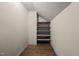 Small closet with wooden shelves at 9847 Snow Camp Rd, Snow Camp, NC 27349