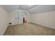 Bedroom with double door closet and access to hallway at 9847 Snow Camp Rd, Snow Camp, NC 27349