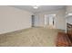 Spacious living area with carpet and views to other rooms at 9847 Snow Camp Rd, Snow Camp, NC 27349