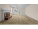 Living room with carpet, fireplace, and neutral walls at 9847 Snow Camp Rd, Snow Camp, NC 27349