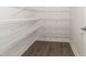 Walk-in pantry with ample shelving for storage at 100 Lemon Drop Ln, Franklinton, NC 27525