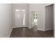 Bright entryway with wood-look floors and access to other rooms at 100 Lemon Drop Ln, Franklinton, NC 27525