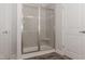 Clean shower with tiled walls and a glass enclosure. Includes a built-in seat at 100 Lemon Drop Ln, Franklinton, NC 27525