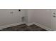 Convenient laundry room with tile floor and built-in cabinets at 100 Lemon Drop Ln, Franklinton, NC 27525