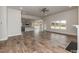 Open living room with hardwood floors and kitchen view at 100 Lemon Drop Ln, Franklinton, NC 27525