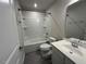 Full bathroom with tub/shower combo and updated vanity at 443 Cross Country Way, Durham, NC 27703