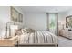 Spacious bedroom with large bed and neutral decor at 2553 Lily Dr # 194, Haw River, NC 27258