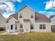 Two-story house with vinyl siding and a backyard at 713 Sequoia Ridge Dr, Fuquay Varina, NC 27526