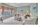 Bright living room with a view and neutral color palette at 713 Sequoia Ridge Dr, Fuquay Varina, NC 27526