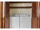 Laundry closet with washer and dryer at 2494 Joel Johnson Rd, Lillington, NC 27546