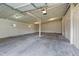 Spacious garage interior with high ceilings at 2494 Joel Johnson Rd, Lillington, NC 27546