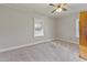 Bedroom with ceiling fan and two windows at 2494 Joel Johnson Rd, Lillington, NC 27546