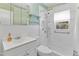 Updated bathroom with walk-in shower and grab bars at 2494 Joel Johnson Rd, Lillington, NC 27546