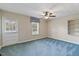 Bright bedroom featuring a ceiling fan and exterior access at 2494 Joel Johnson Rd, Lillington, NC 27546