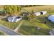 Aerial view of house, detached garage, and large lot at 2494 Joel Johnson Rd, Lillington, NC 27546