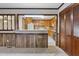 Kitchen features wood cabinets and a breakfast bar at 2494 Joel Johnson Rd, Lillington, NC 27546
