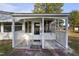 Enclosed porch with lattice sides and door at 2494 Joel Johnson Rd, Lillington, NC 27546