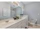 Bathroom with double vanity, shower, and toilet at 106 Keeneland Dr, Oxford, NC 27565