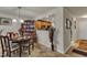 Charming dining room features a wooden table, chairs, and built-in shelving at 8520 Quarton Dr, Raleigh, NC 27616