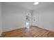 Hardwood floor bedroom with French doors leading to a private deck at 623 W Club Blvd, Durham, NC 27701