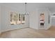 Spacious dining room with hardwood floors and a view of the backyard at 2105 Gentry Rd, Wake Forest, NC 27587