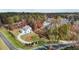 White home in a wooded community with a long driveway at 2105 Gentry Rd, Wake Forest, NC 27587