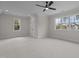 Spacious bedroom with large windows and ceiling fan at 2105 Gentry Rd, Wake Forest, NC 27587