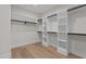 Large walk-in closet with ample shelving and hanging space at 2105 Gentry Rd, Wake Forest, NC 27587