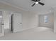 Bright bedroom with window, door to bathroom, and ceiling fan at 2105 Gentry Rd, Wake Forest, NC 27587