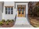 Inviting front entry with double doors and stairs at 2105 Gentry Rd, Wake Forest, NC 27587