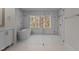 Spa-like bathroom with walk-in shower and freestanding tub at 2105 Gentry Rd, Wake Forest, NC 27587