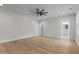 Bedroom with hardwood floors, ceiling fan, and access to bathroom at 2105 Gentry Rd, Wake Forest, NC 27587