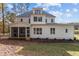 Two-story home with white siding and screened porch at 2105 Gentry Rd, Wake Forest, NC 27587