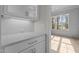 Butlers pantry with white cabinets and quartz countertops at 2105 Gentry Rd, Wake Forest, NC 27587