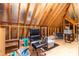Unfished attic space with wood beams and ample storage area at 204 Harvest Ln, Pittsboro, NC 27312