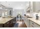 Open concept kitchen with breakfast area and stainless steel appliances at 204 Harvest Ln, Pittsboro, NC 27312