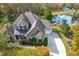 Stunning two-story home with stone accents and a three-car garage at 204 Harvest Ln, Pittsboro, NC 27312