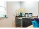 Convenient wet bar with granite countertop and mini-fridge at 204 Harvest Ln, Pittsboro, NC 27312