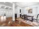 Elegant dining room with hardwood floors, chandelier, and built-in cabinetry at 204 Harvest Ln, Pittsboro, NC 27312