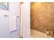 Bathroom with tub, shower and tile surround at 204 Harvest Ln, Pittsboro, NC 27312