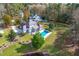 Luxury home with pool and pond, nestled in a peaceful neighborhood at 204 Harvest Ln, Pittsboro, NC 27312