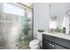 Modern bathroom with shower, toilet, and vanity at 204 Harvest Ln, Pittsboro, NC 27312