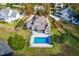 Aerial view showing home, pool, and pond at 204 Harvest Ln, Pittsboro, NC 27312